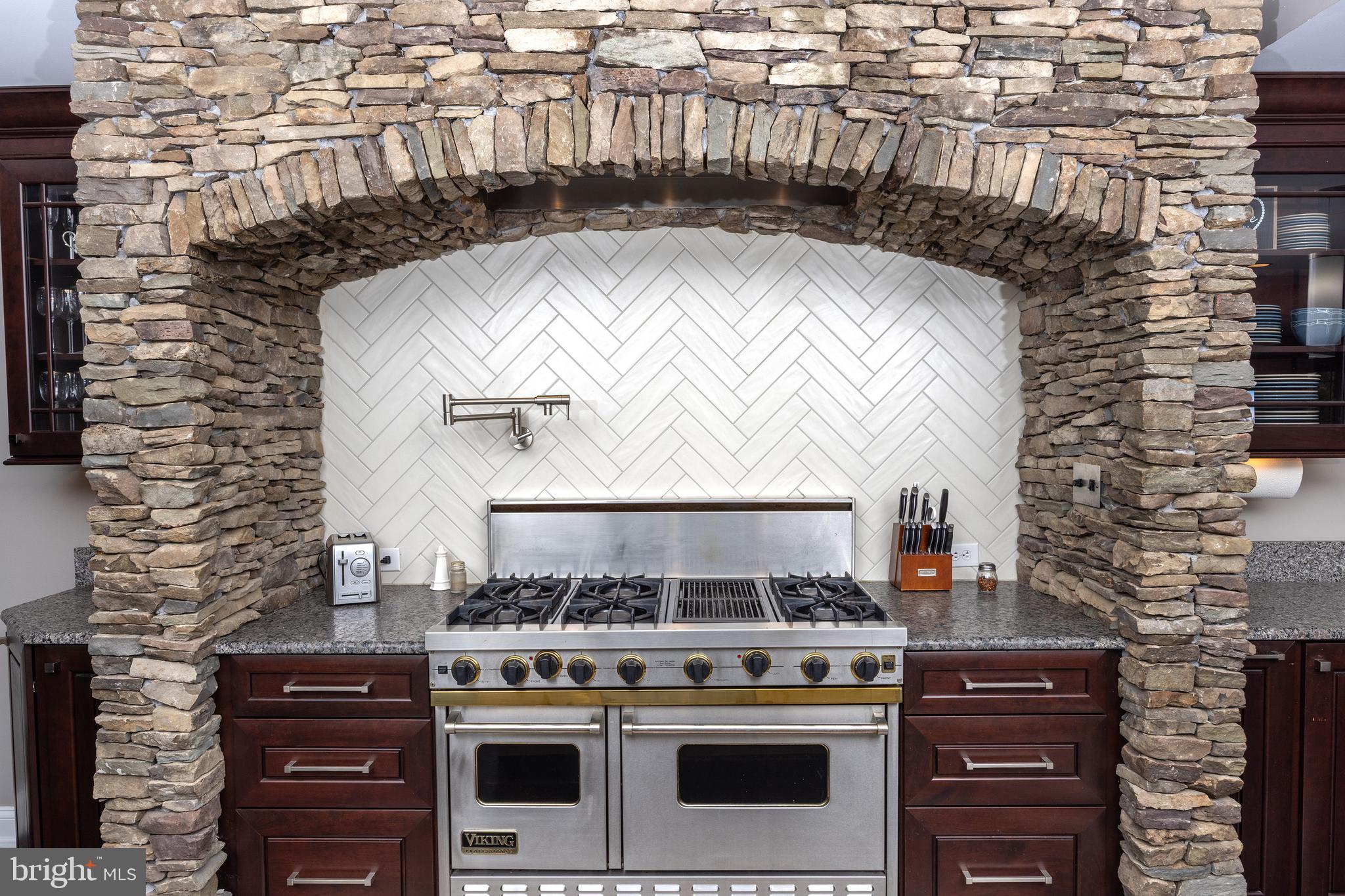 6469 Groveland Road Pipersville, PA 18947 - Photo 9 of 53 a stove top oven sitting inside of a kitchen