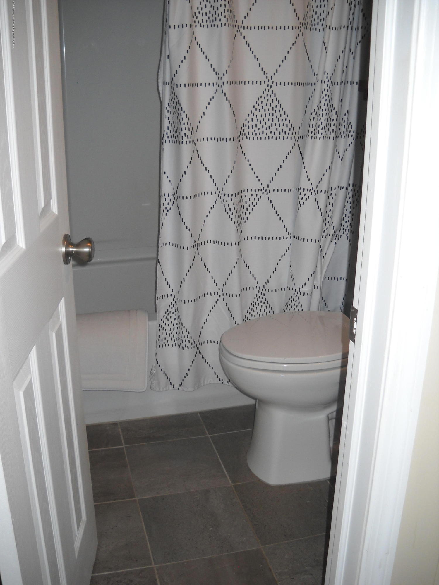 32 Hornerstown Road Cream Ridge, NJ 08514 - Photo 11 of 19 a bathroom with a toilet and a shower