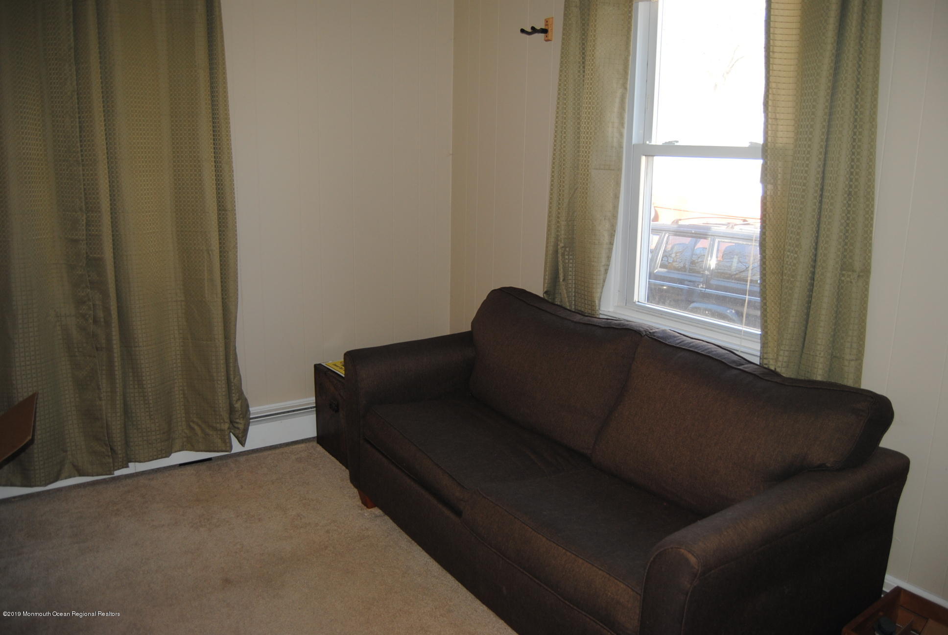 32 Hornerstown Road Cream Ridge, NJ 08514 - Photo 18 of 19 a living room with furniture and a window