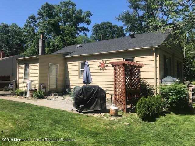 32 Hornerstown Road Cream Ridge, NJ 08514 - Photo 4 of 19 a backyard of a house with yard table and chairs
