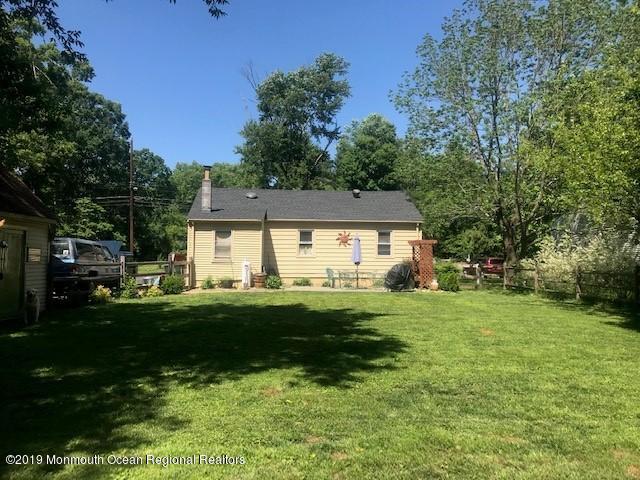 32 Hornerstown Road Cream Ridge, NJ 08514 - Photo 5 of 19 a view of a big house with a big yard and large trees