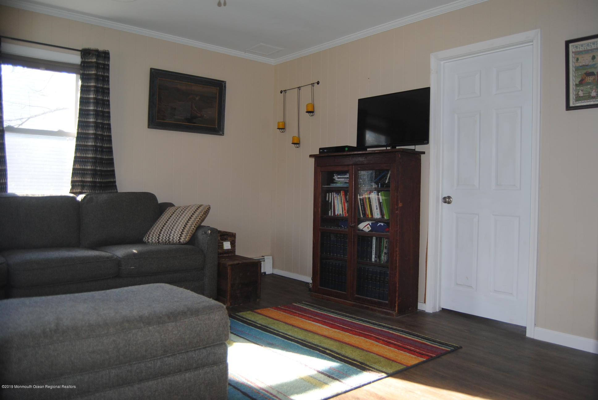 32 Hornerstown Road Cream Ridge, NJ 08514 - Photo 9 of 19 a living room with furniture and a flat screen tv