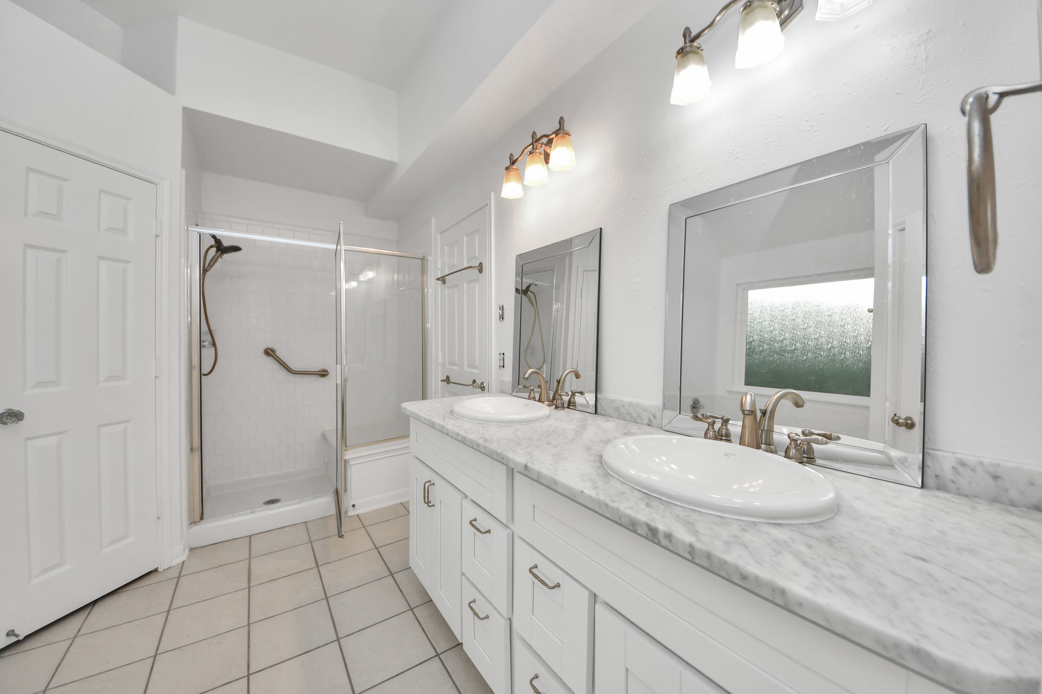 5622 Pineaster Pointe Lane Spring, TX 77379 - Photo 23 of 40 Bathroom featuring a double vanity with white cabinetry and light-toned countertops