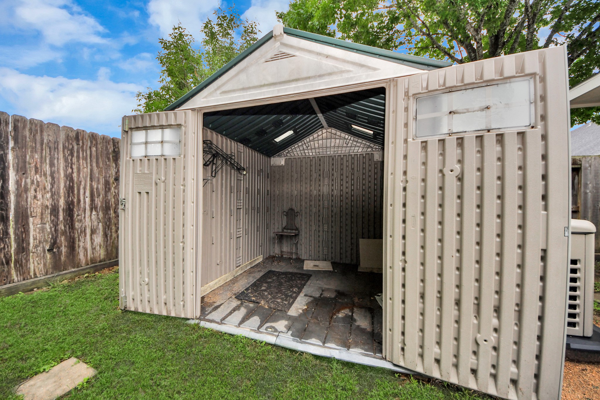 5622 Pineaster Pointe Lane Spring, TX 77379 - Photo 35 of 40 Outdoor storage shed with double doors and transom windows