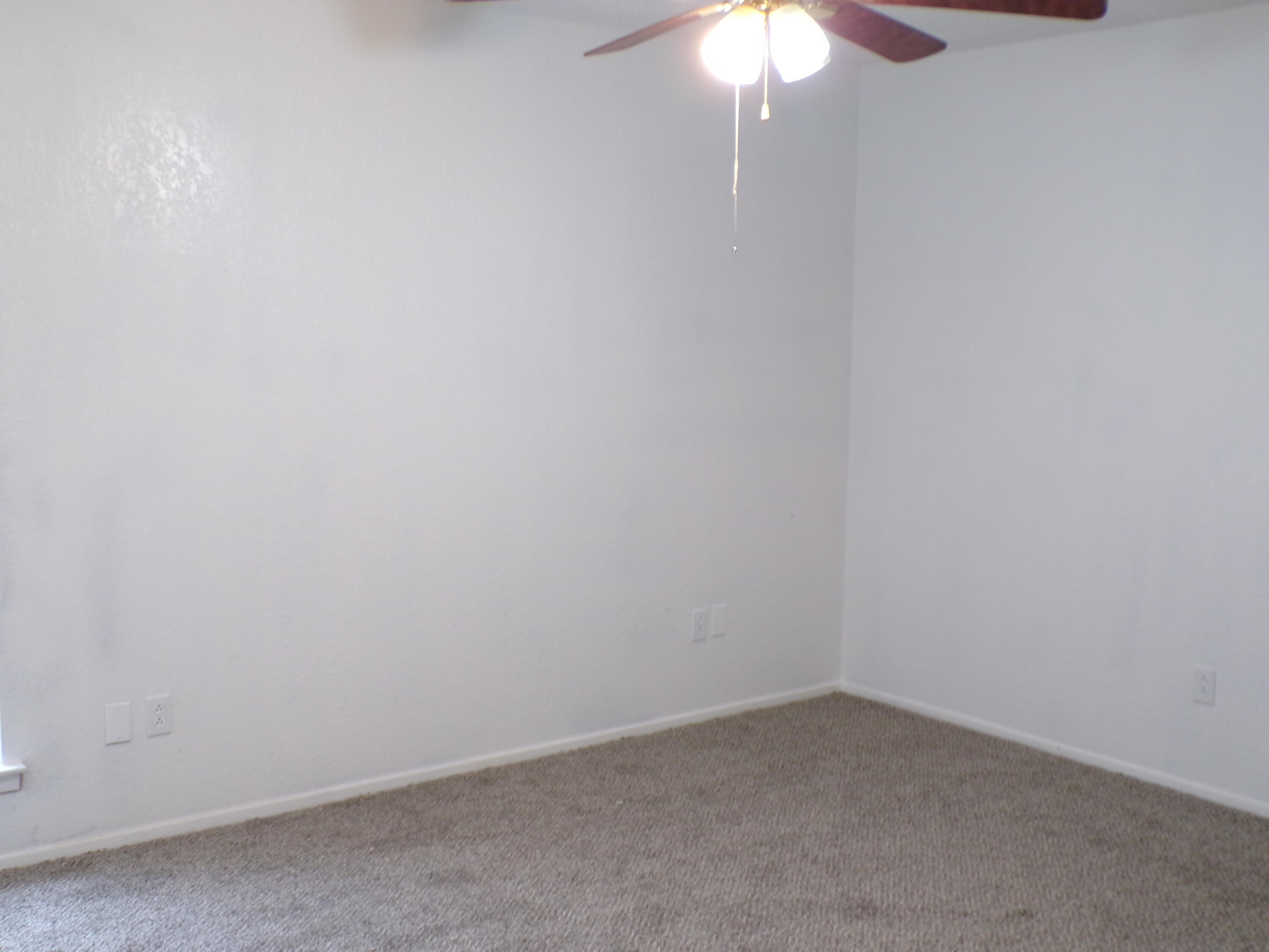 5916 14th Street Lubbock, TX 79416 - Photo 11 of 22 a room that has a window in it