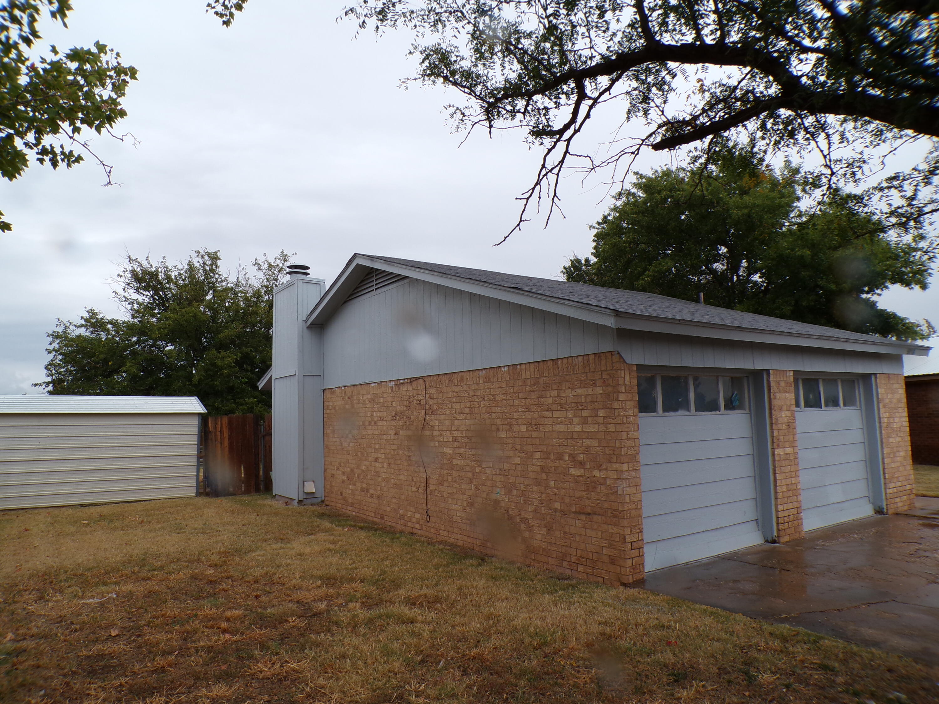 5916 14th Street Lubbock, TX 79416 - Photo 2 of 22 a view of backyard of house