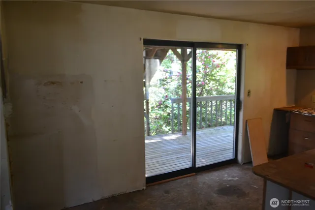 a room with a bed and a window