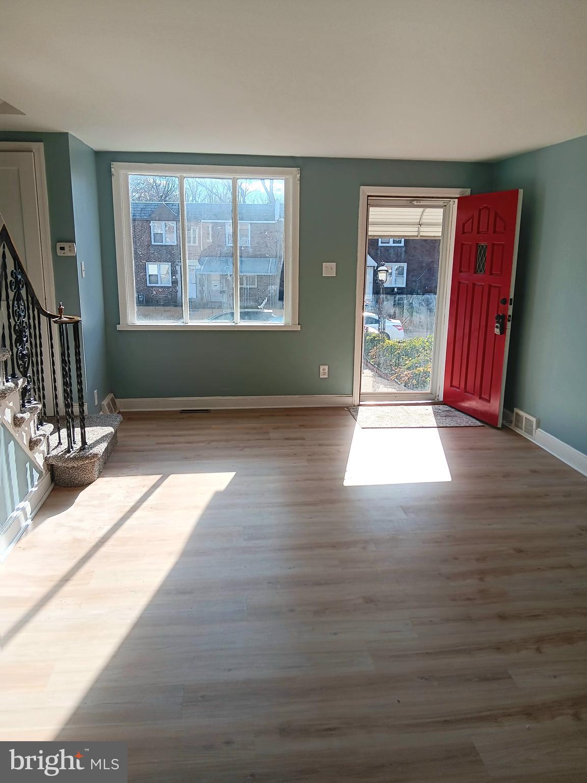 26 East Lynbrook Road Collingdale, PA 19023 - Photo 4 of 21 wooden floor in an empty room with a window
