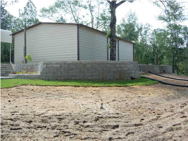 6010 Clear Creek Road Crestview, FL 32539 - Photo 8 of 8 a backyard of a house