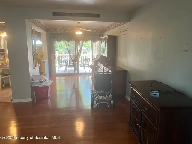 a view of a living room and dining room