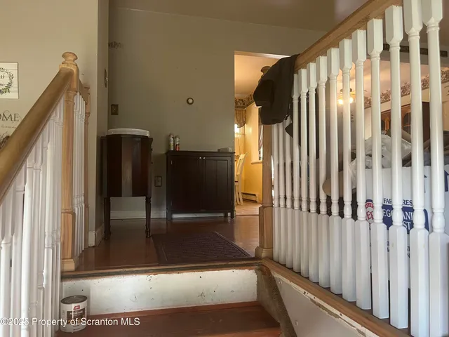 a kitchen with furniture a sink and a stove