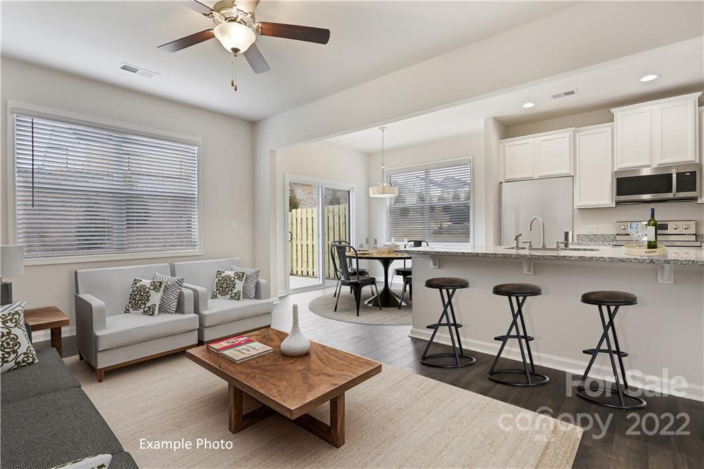 3734 Yorkshire Place Terrell, NC 28682 - Photo 3 of 13 a living room with furniture and a large window