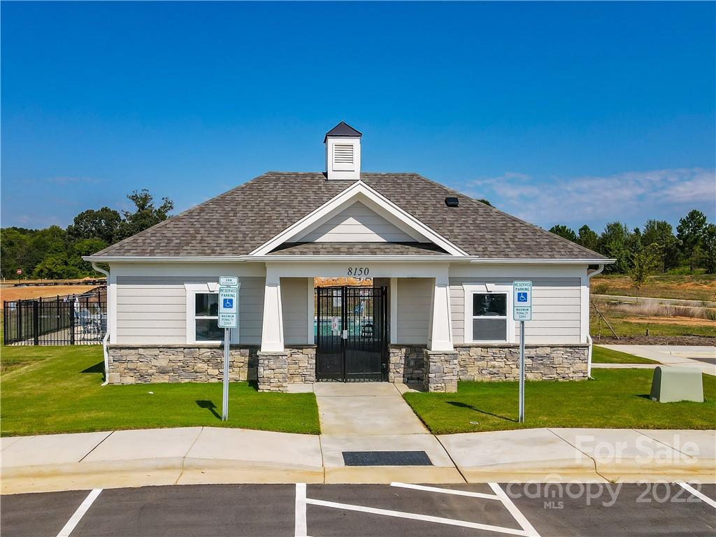 3734 Yorkshire Place Terrell, NC 28682 - Photo 10 of 13 a front view of a house with a yard and garage