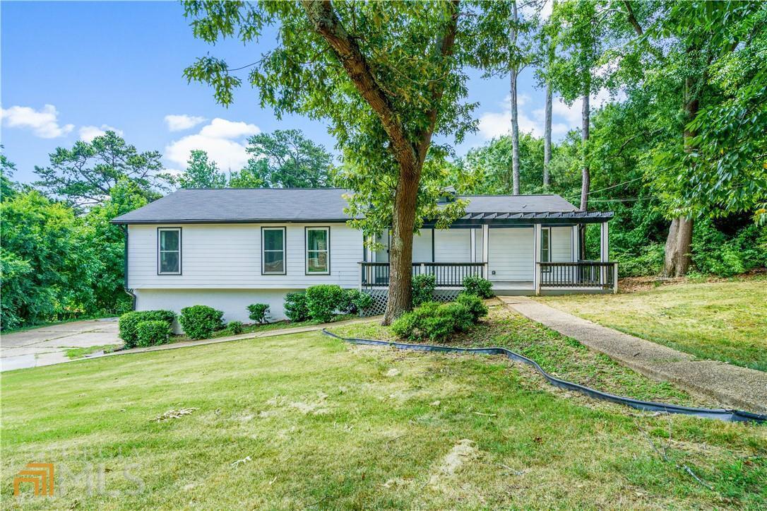 3015 Caldwell Road Northeast Brookhaven, GA 30319 - Photo 1 of 1 a view of a house with a yard