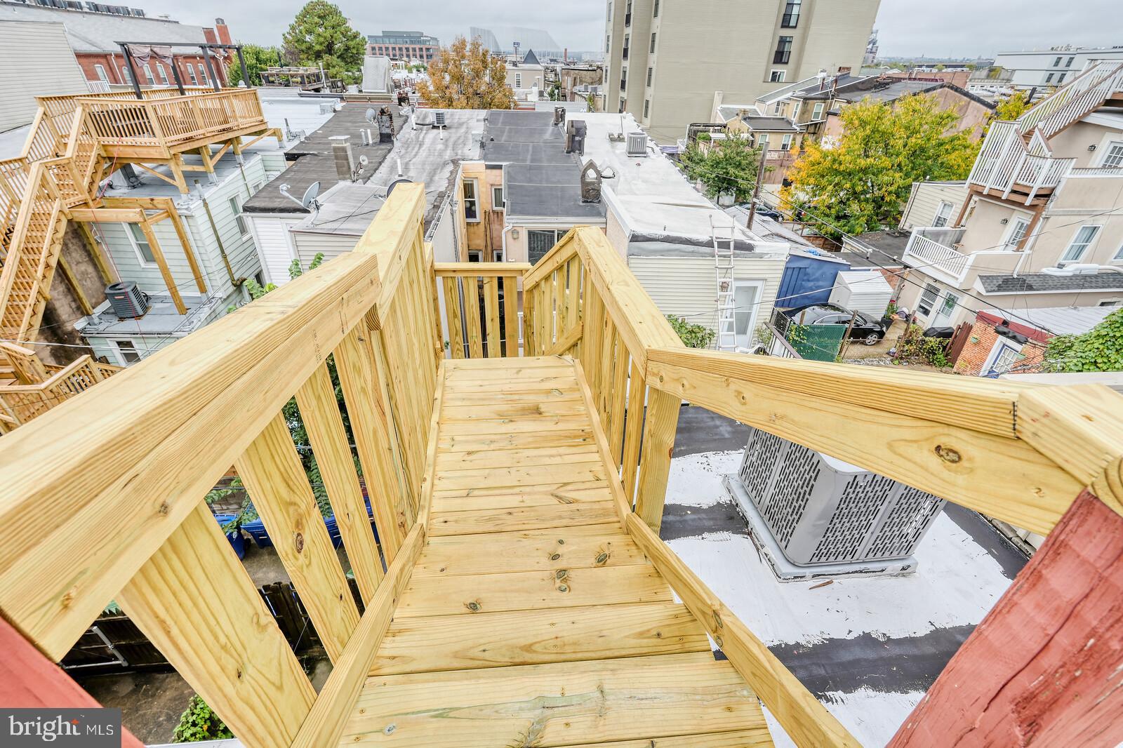 1212 Marshall Street Baltimore, MD 21230 - Photo 29 of 39 a view of a swimming pool with a chairs