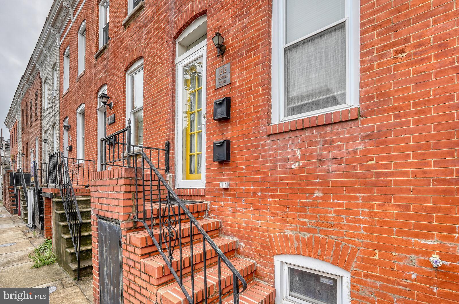 1212 Marshall Street Baltimore, MD 21230 - Photo 3 of 39 a view of a brick building with many windows