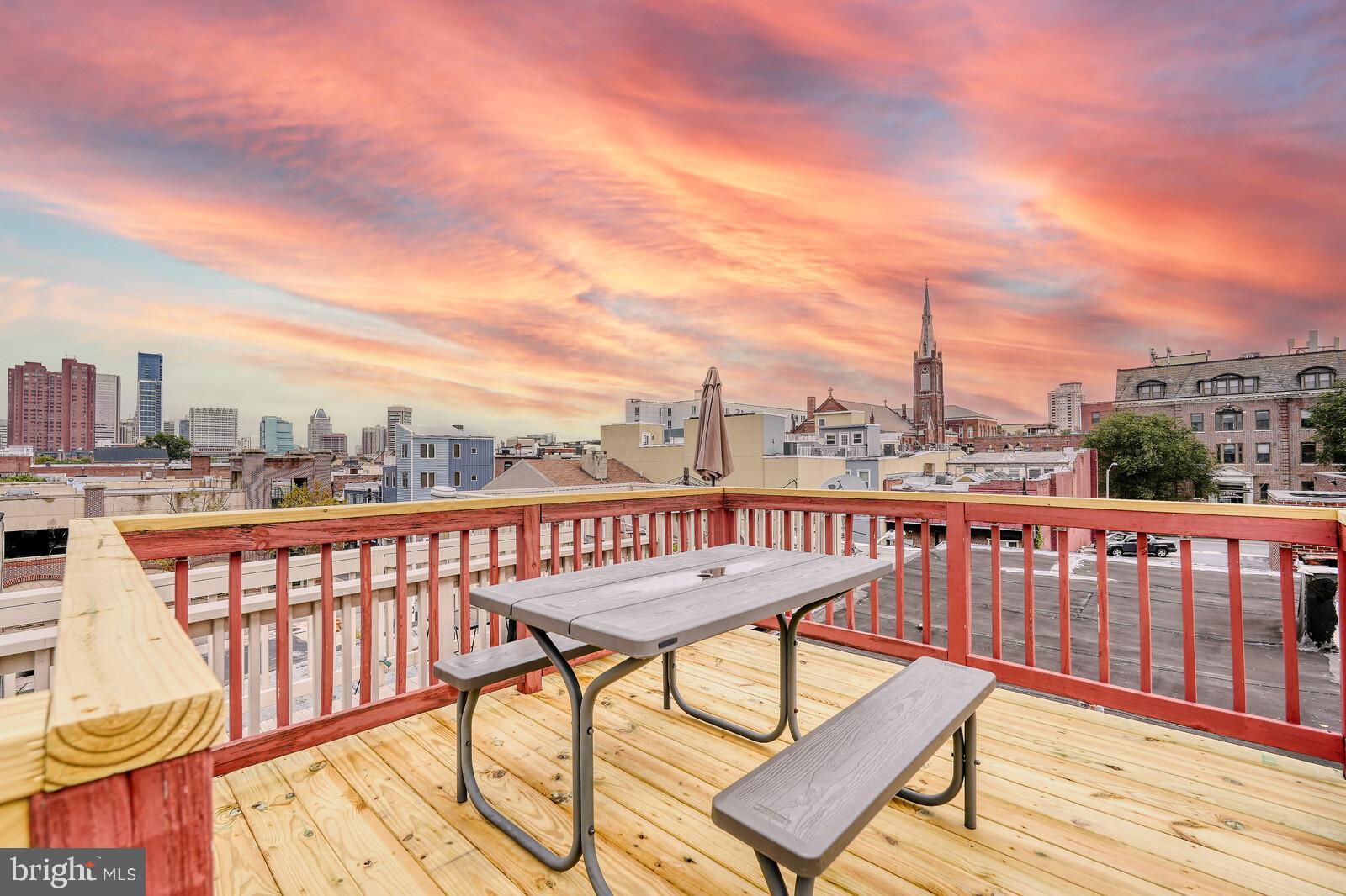 1212 Marshall Street Baltimore, MD 21230 - Photo 32 of 39 a view of a balcony with wooden benches