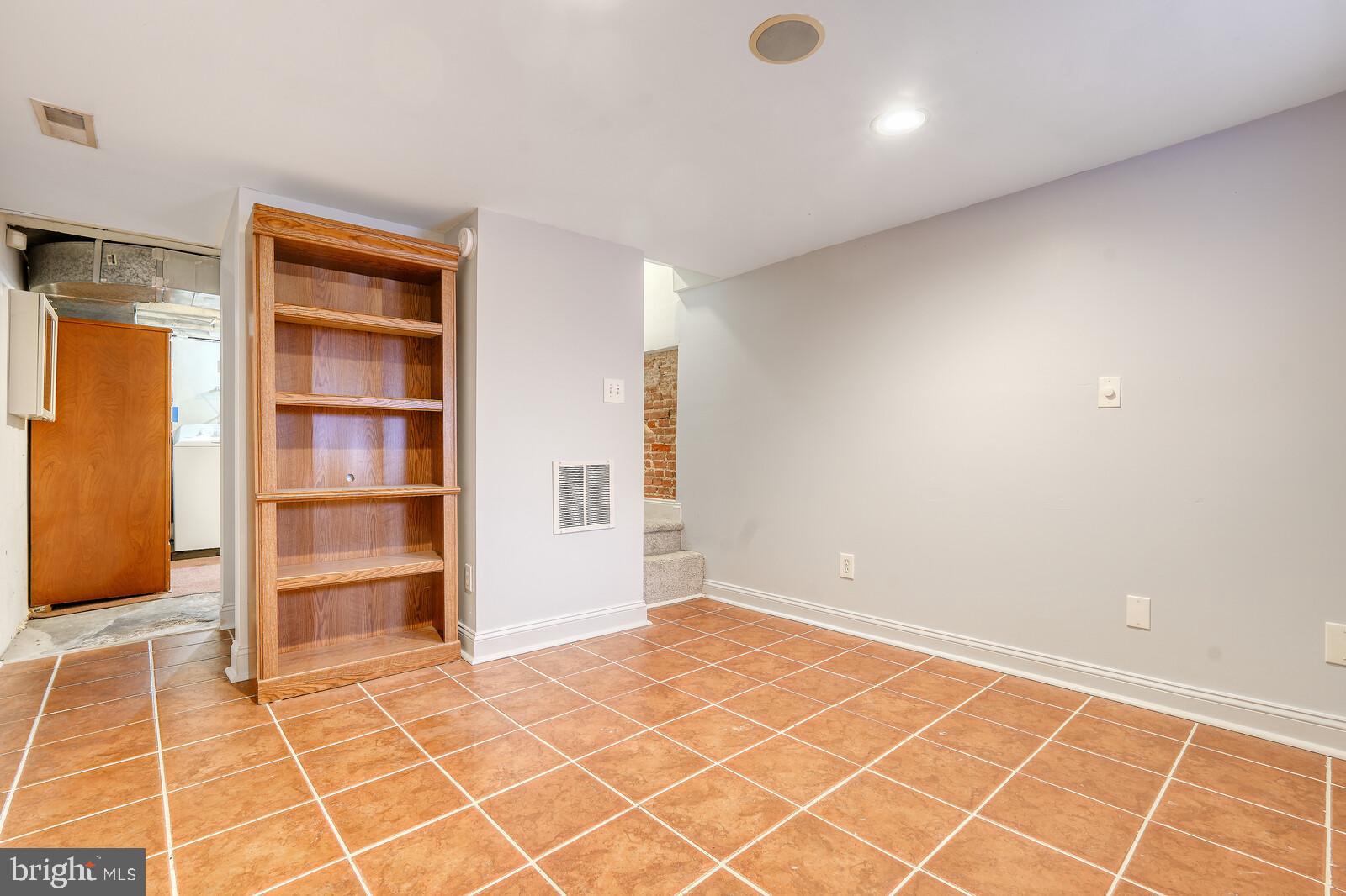 1212 Marshall Street Baltimore, MD 21230 - Photo 38 of 39 a view of an empty room with a window