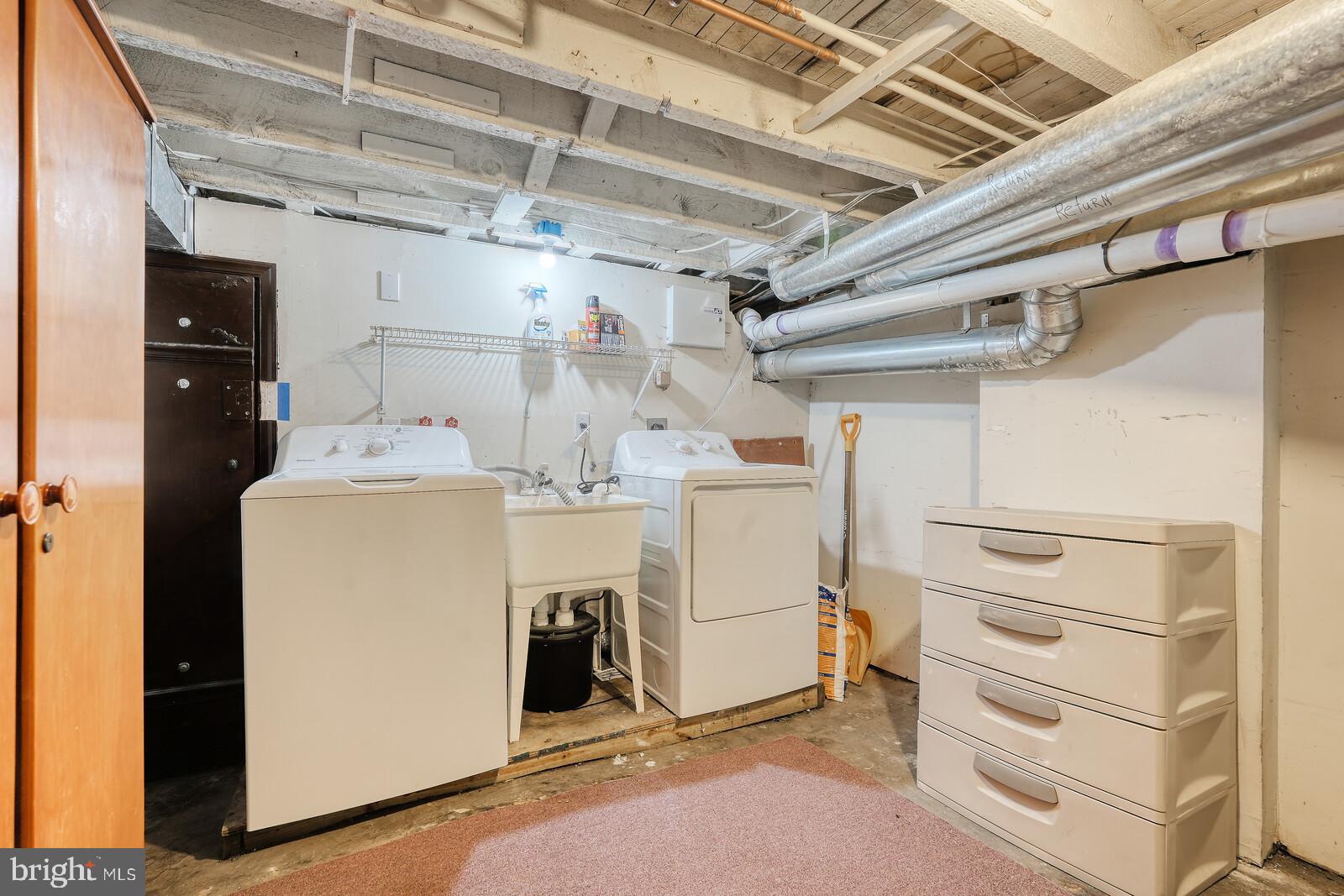 1212 Marshall Street Baltimore, MD 21230 - Photo 39 of 39 a utility room with dryer and washer