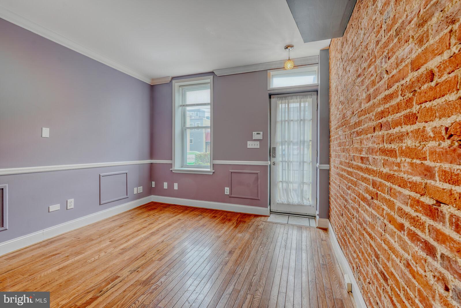 1212 Marshall Street Baltimore, MD 21230 - Photo 4 of 39 a view of a livingroom with wooden floor