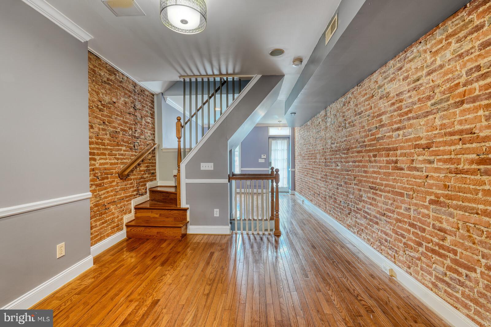 1212 Marshall Street Baltimore, MD 21230 - Photo 7 of 39 a view of entryway with wooden floor