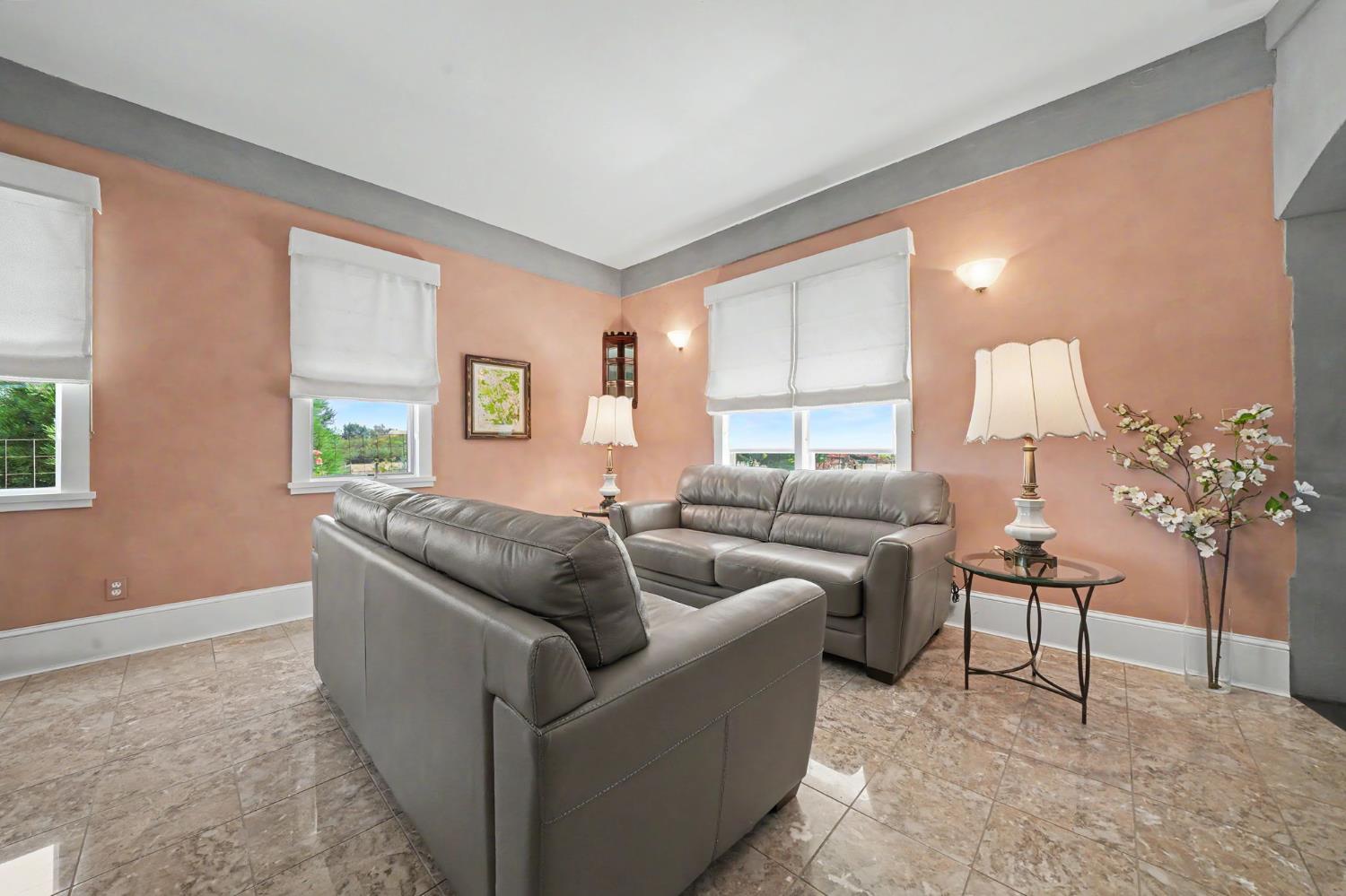 15070 Willow Creek Road Ione, CA 95640 - Photo 20 of 66 a living room with furniture and a potted plant