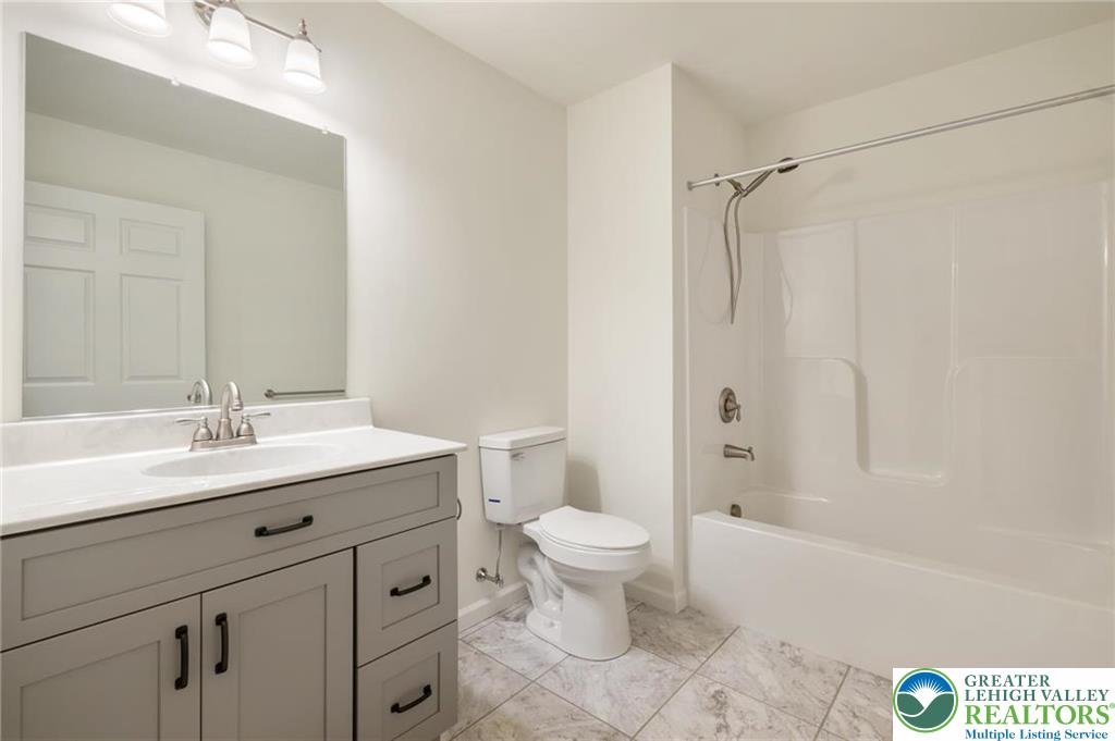 16 Ricks Road New Ringgold, PA 17960 - Photo 11 of 15 a bathroom with a sink a toilet and shower