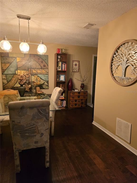140 Callaway Avenue Spring Hill, FL 34606 - Photo 12 of 16 a view of a living room and dining room