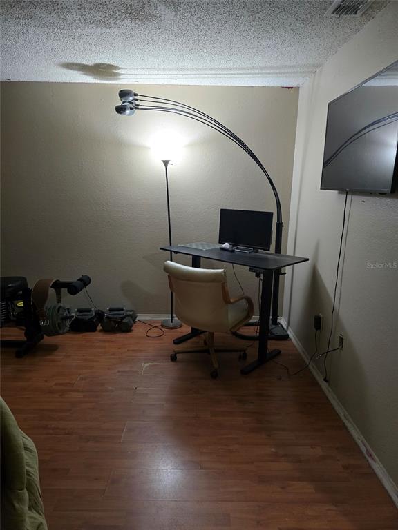 140 Callaway Avenue Spring Hill, FL 34606 - Photo 4 of 16 a workspace with furniture