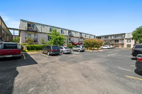 a car parked in front of a building