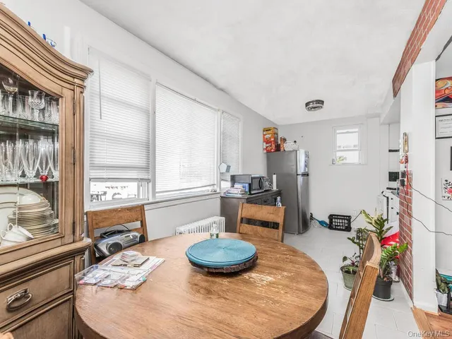 a room with furniture and a wooden floor