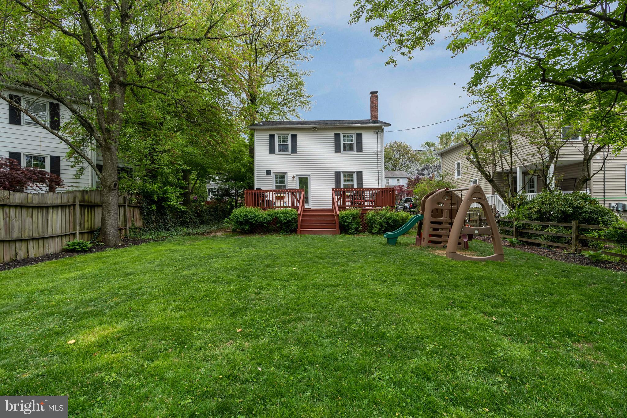 508 Brook Road Towson, MD 21286 - Photo 5 of 37 Backyard with playground equipment and deck