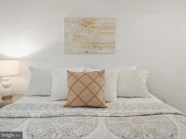 a bathroom with a granite countertop toilet sink and shower