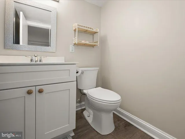 a balcony with table and chairs