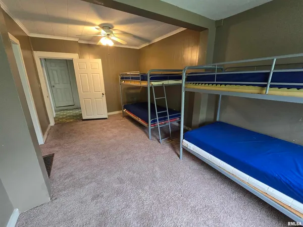 a utility room with cabinets washer and dryer