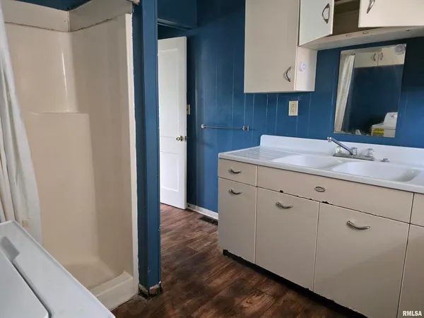 a view of a hallway with toilet