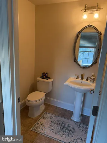 a kitchen with a sink cabinets and appliances
