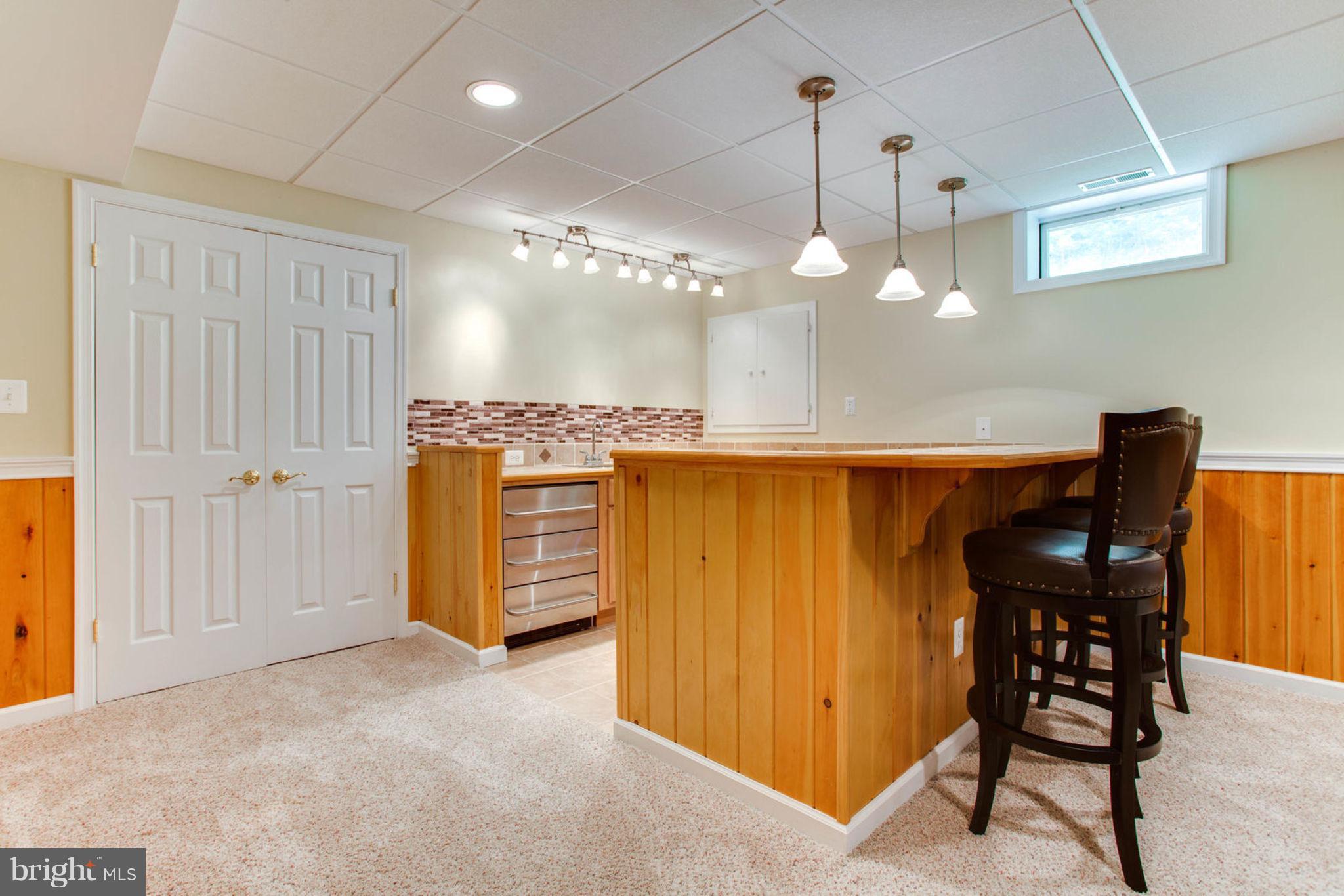 9703 Crest Hill Road Marshall, VA 20115 - Photo 27 of 29 Custom Wet Bar with Pendant Lighting