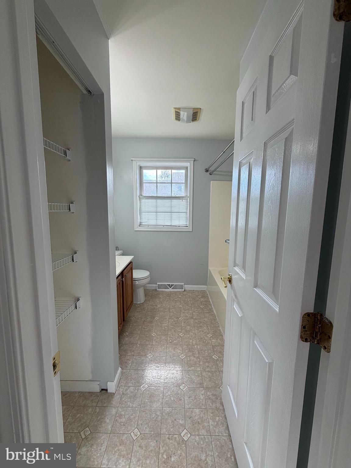 3948 Laurel Run Columbia, PA 17512 - Photo 8 of 26 a view of an empty room with a fireplace and a window