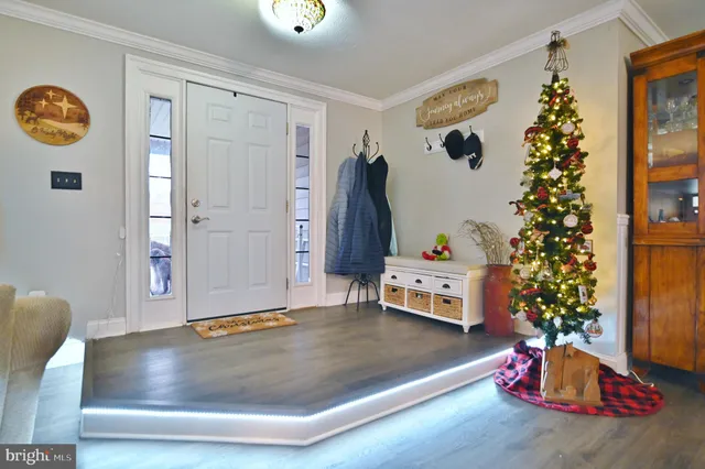a view of a swimming pool with an outdoor space and seating area