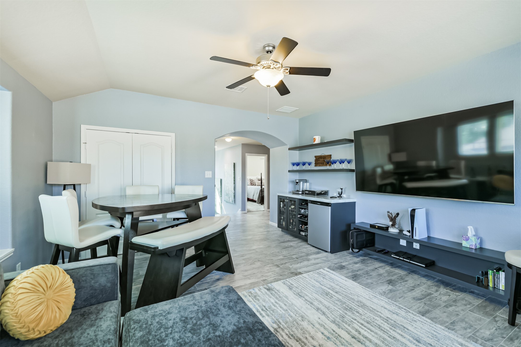 24047 Schults Meadow Lane Spring, TX 77389 - Photo 31 of 47 a living room with furniture and a flat screen tv