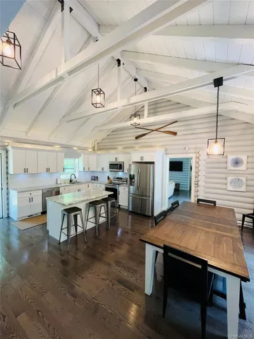 a view of a dining room with furniture