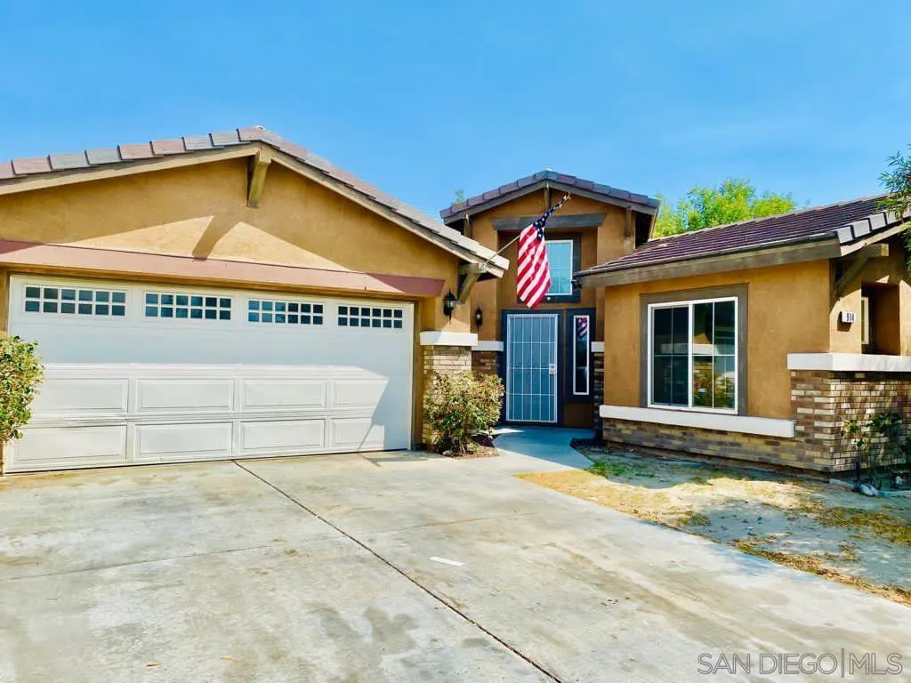 914 Aria Road Hemet, CA 92543 - Photo 1 of 27 a view of a house with a garage