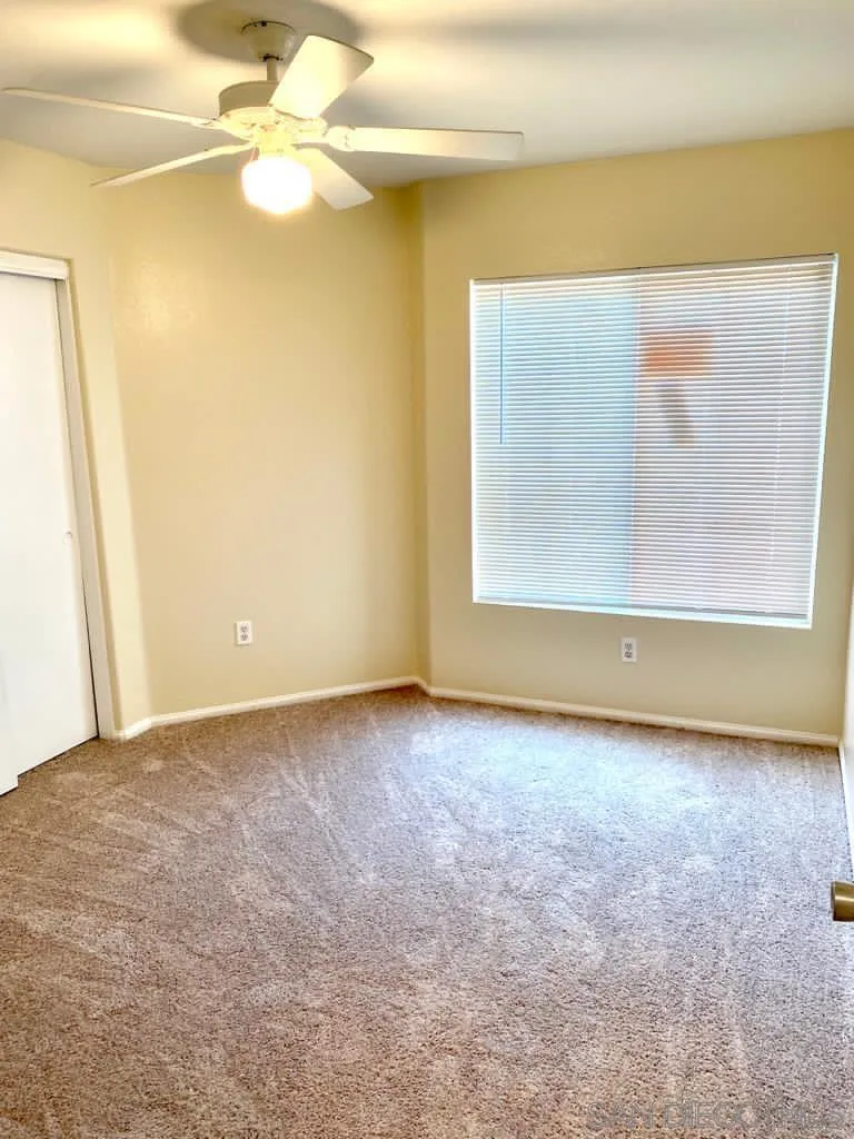 914 Aria Road Hemet, CA 92543 - Photo 16 of 27 a view of a big room with windows