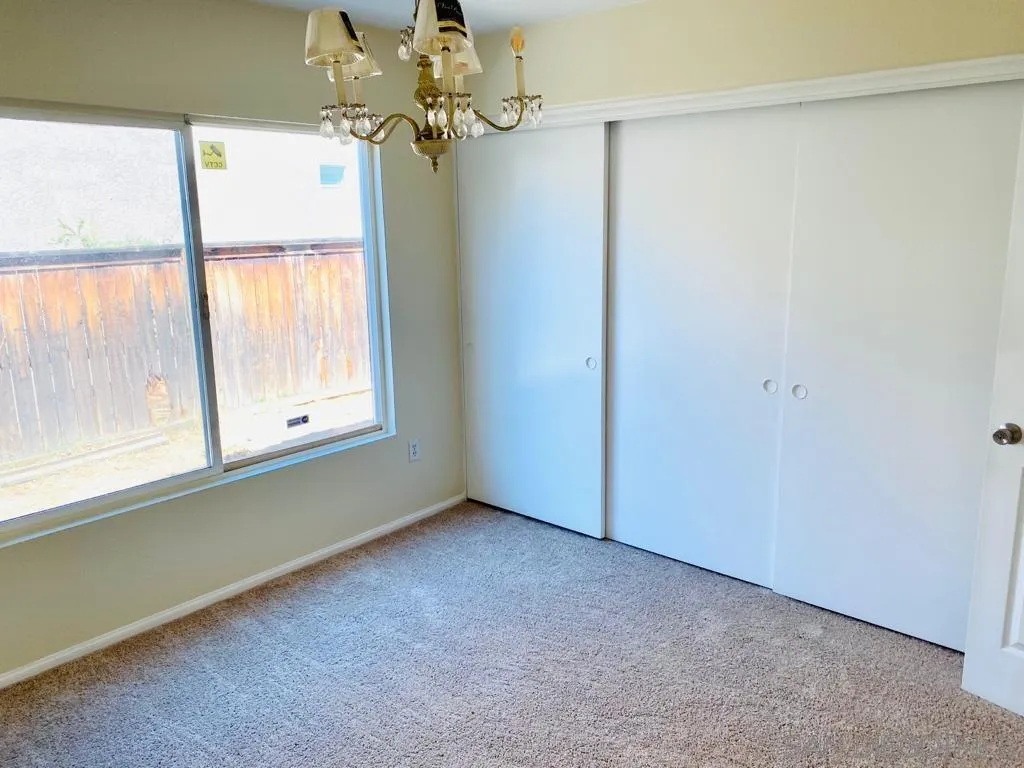 914 Aria Road Hemet, CA 92543 - Photo 17 of 27 an empty room with a window