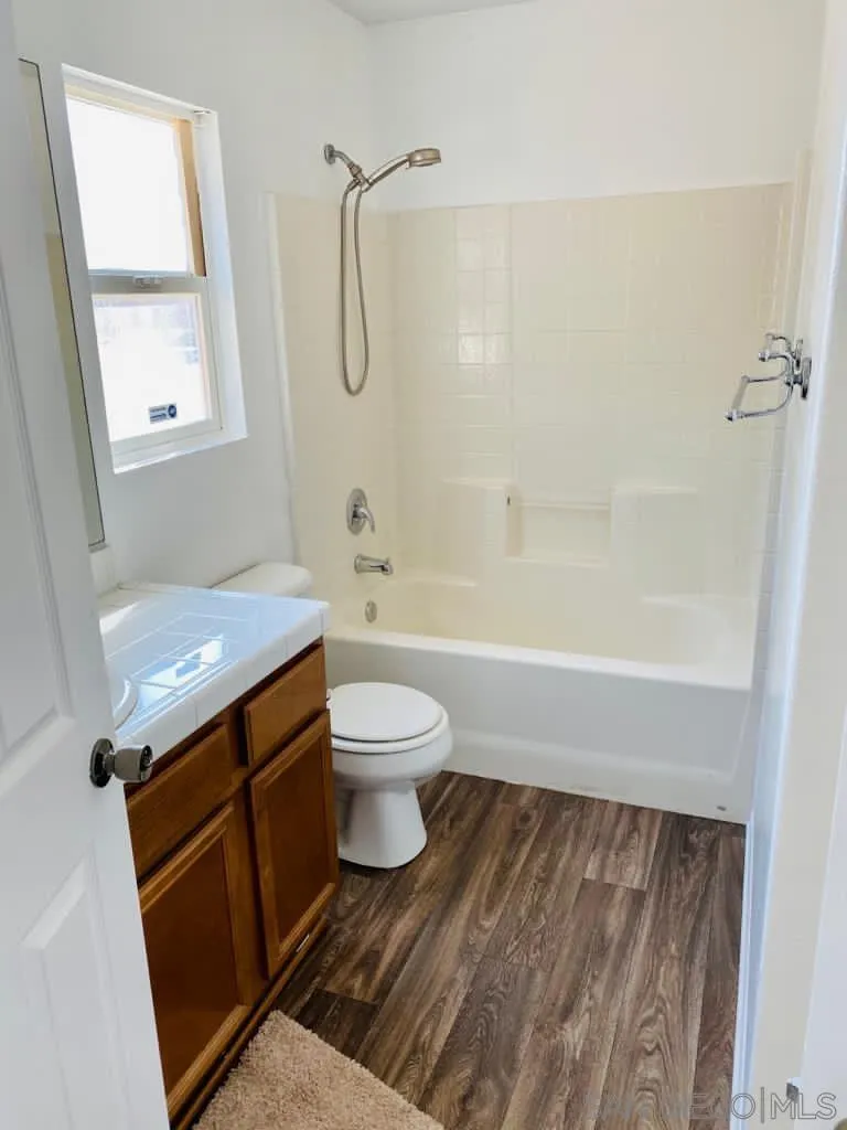 914 Aria Road Hemet, CA 92543 - Photo 20 of 27 a bathroom with a toilet and a shower