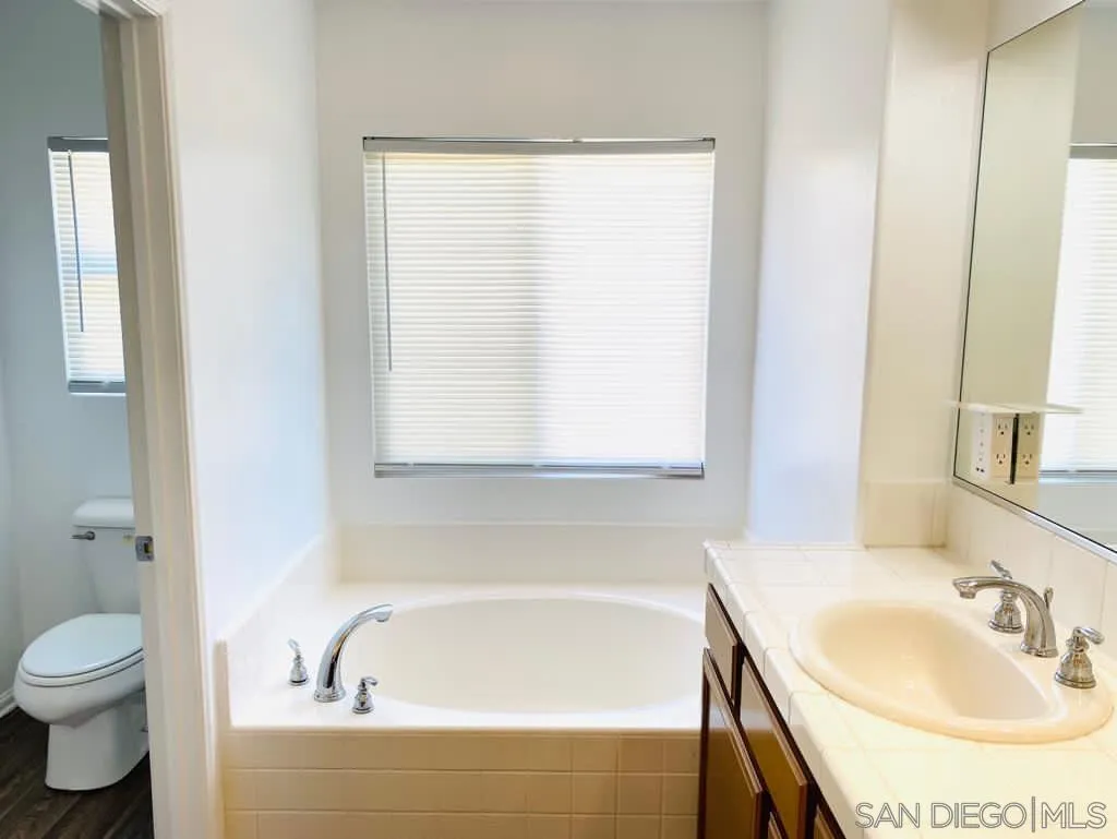 914 Aria Road Hemet, CA 92543 - Photo 23 of 27 a bathroom with a sink and a bathtub