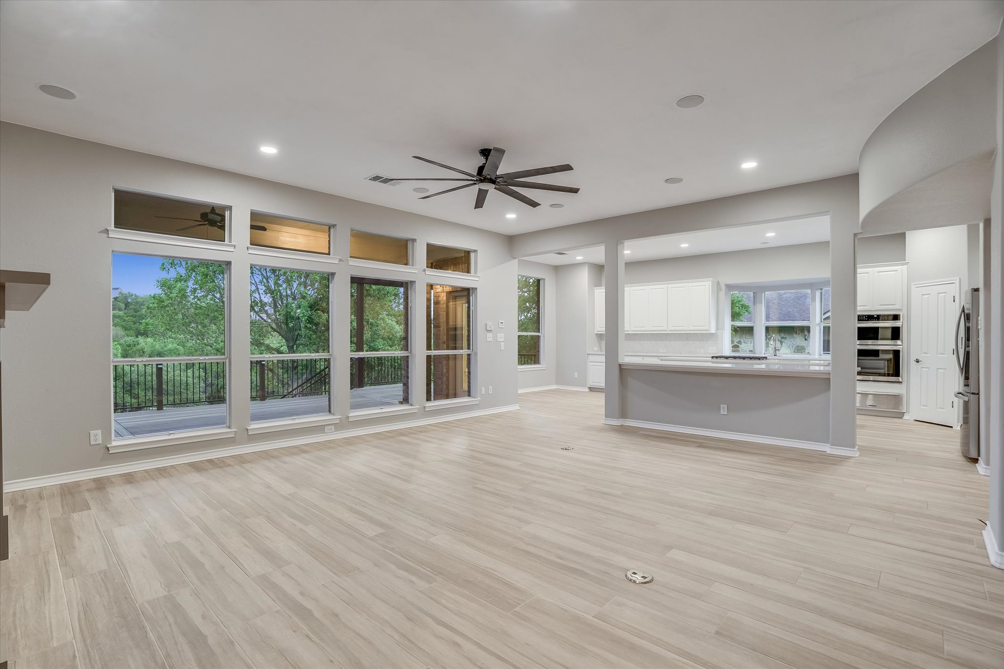 1400 Tom Sawyer Road Austin, TX 78737 - Photo 11 of 40 Multiple living areas provide flexibility for everyday living and entertaining.