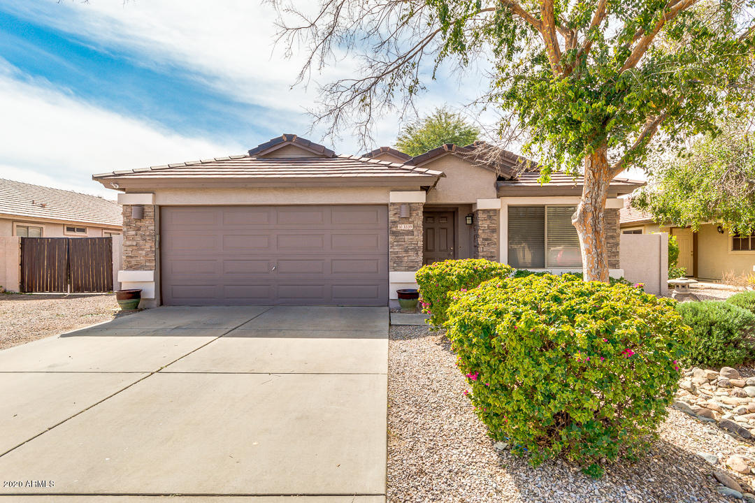 3339 East Bonanza Road Gilbert, AZ 85297 - Photo 1 of 47 a front view of a house with garden