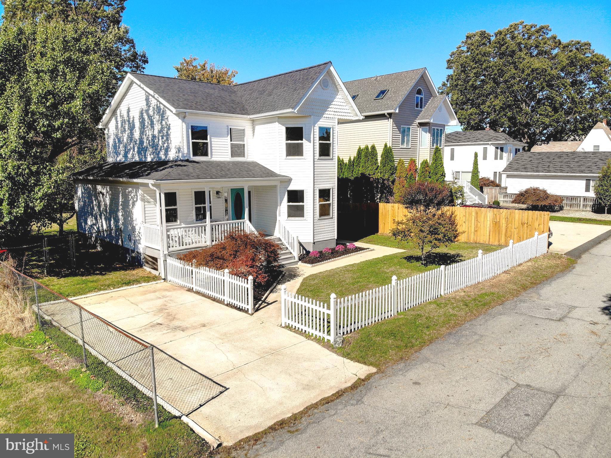 8714 C Street Chesapeake Beach, MD 20732 - Photo 3 of 66 a view of house with yard street and seating area